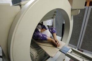 Iranian woman undergoing diagnostic scan